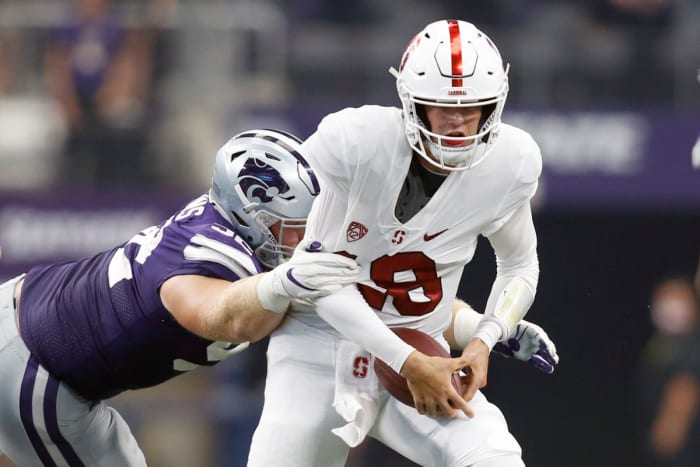 Kansas State defensive tackle Eli Huggins (92) sacks Stanford quarterback Tanner McKee (18).